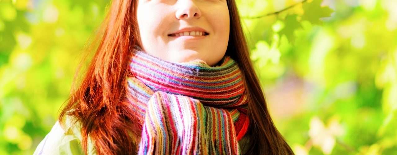 Young woman in spring garden.
